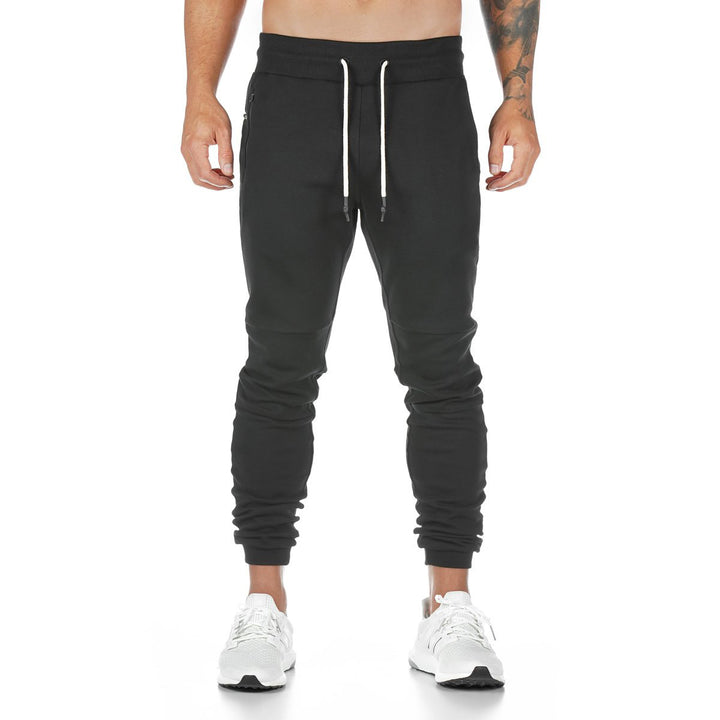 Herren nan schmal geschnittene Jogginghose mit Rippbund, Reißverschlusstasche und Knieabnähern Drune