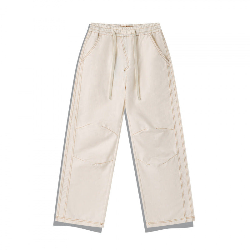 Unisex Weite Denim-Hose mit elastischem Bund, Kordelzug und gesteppter Kniepasse Drune