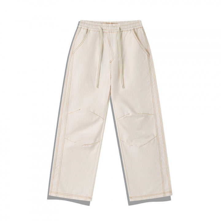 Unisex Weite Denim-Hose mit elastischem Bund, Kordelzug und gesteppter Kniepasse Drune