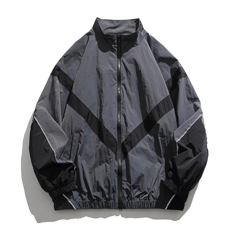 [Unisex] Oversize technische Wind- und Regenjacke mit Stehkragen, reflektierenden Paspeln und elastischem Saum Drune