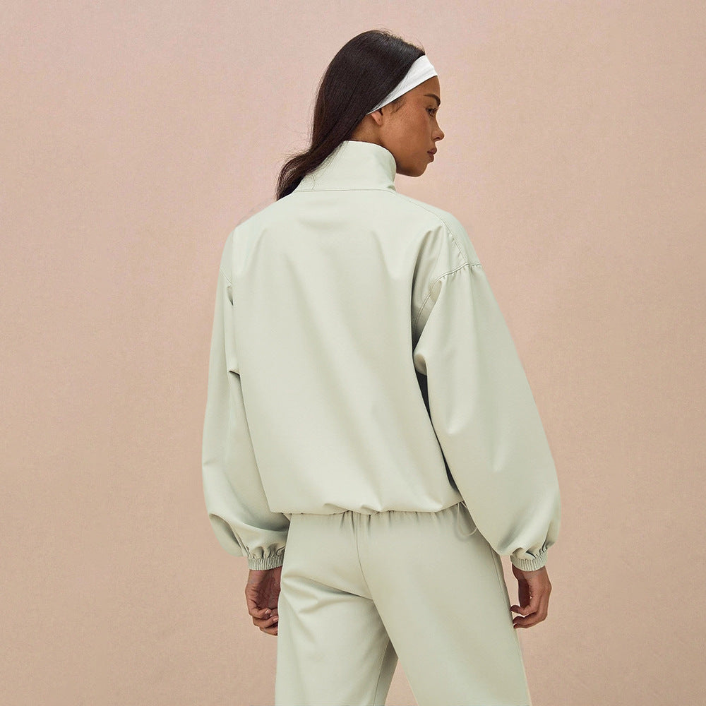 Damen Oversize-Trainingsset mit Stehkragen Ballonärmeln und weiten Kordelhosen Drune