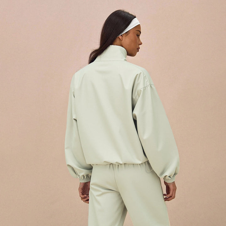 Damen Oversize-Trainingsset mit Stehkragen Ballonärmeln und weiten Kordelhosen Drune