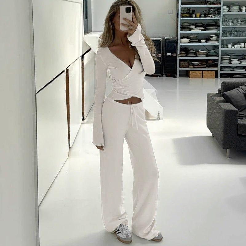 Damen nan Wickel-Cropped-Top mit tiefem V‑Ausschnitt, taillierter Wickelform und langen Glockenärmeln Drune