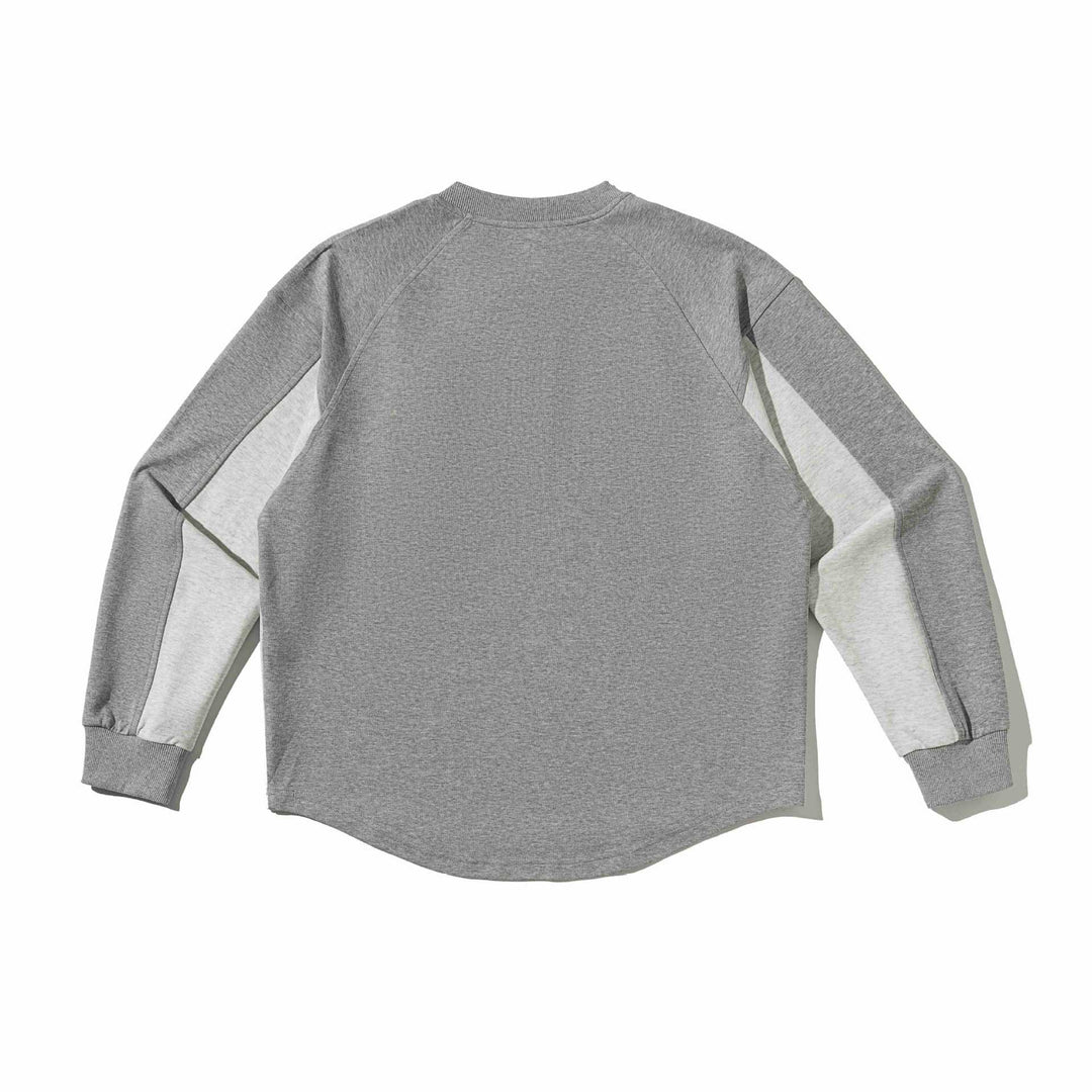 Unisex Raglan‑Sweatshirt mit halbrundem Saum und aufgesetzter Brusttasche Drune
