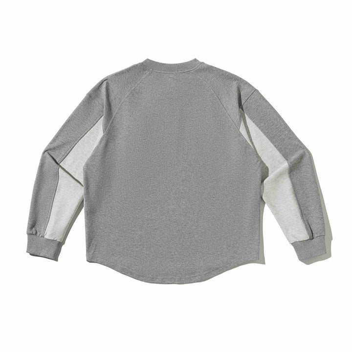 Unisex Raglan‑Sweatshirt mit halbrundem Saum und aufgesetzter Brusttasche Drune