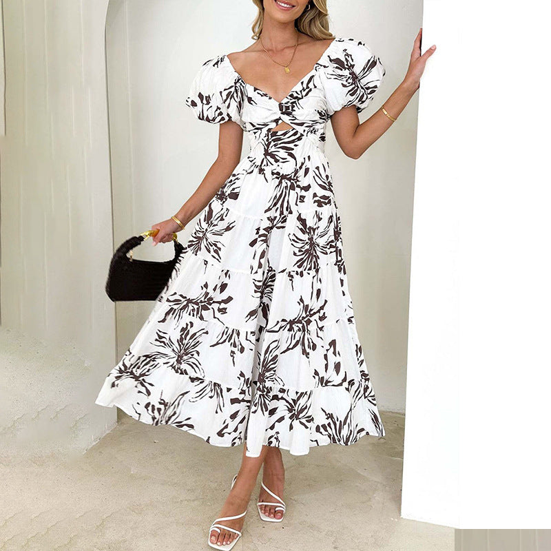 Damen Maxikleid mit voluminösen Puffärmeln und floralem Design Drune
