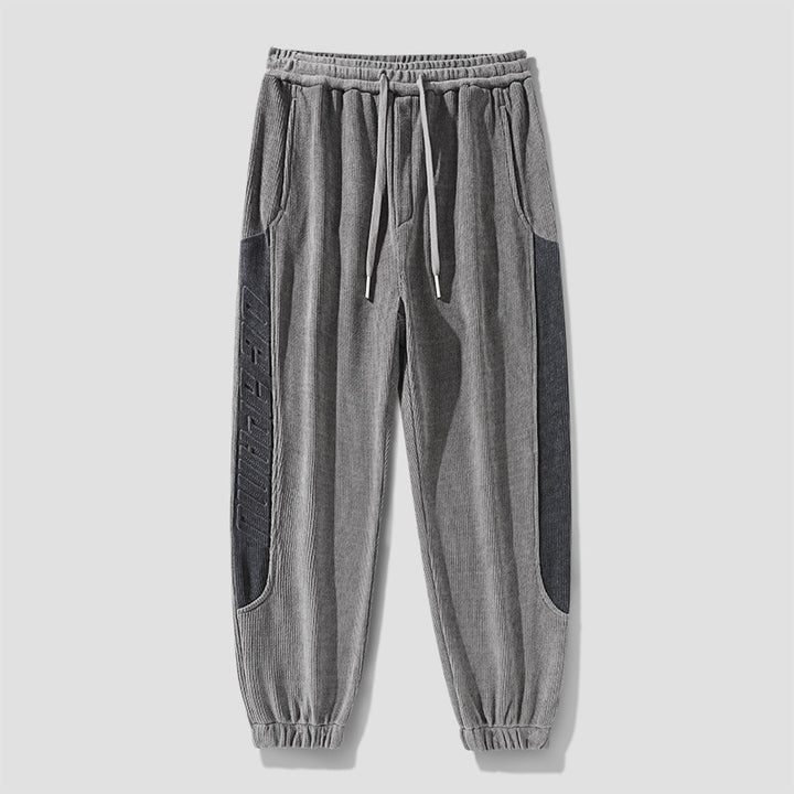 Herren Cordhose im Joggingstil mit seitlichen Panel‑Einsätzen und Kordelzug Drune