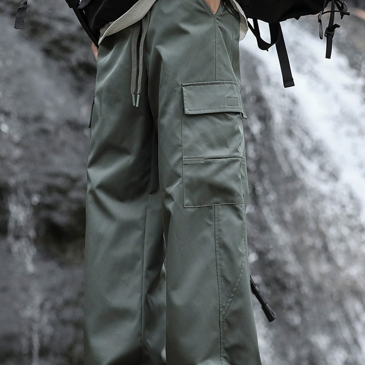 Herren Oversized Outdoor‑Cargohose mit Zugbund, großen Klapp‑ und Utility‑Taschen Drune