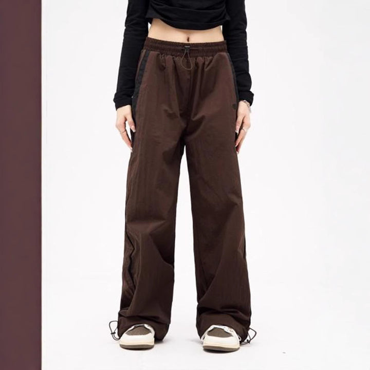Damen nan weite Trackhose mit Kontrastpaspel, elastischem Bund und Oversize-Schnitt Drune