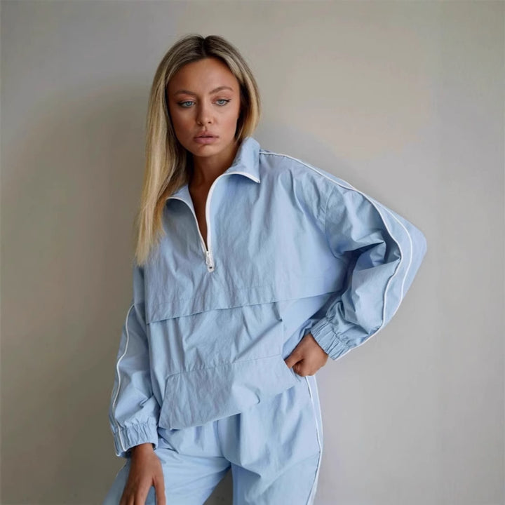 Damen leichtes Half-Zip Windbreaker-Oberteil mit Kängurutasche, elastischen Bündchen und seitlicher Paspel Drune