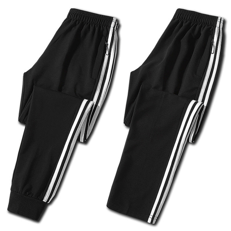 Herren Slim-Fit Trackhose mit seitlichen Kontraststreifen, Reißverschlusstaschen und elastischem Bund Drune