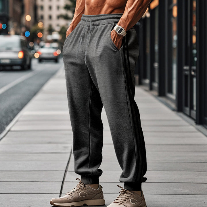 Herren nan sportliche Jogginghose mit seitlichen Kontraststreifen, elastischem Tunnelzugbund und gerippten Beinabschlüssen Drune