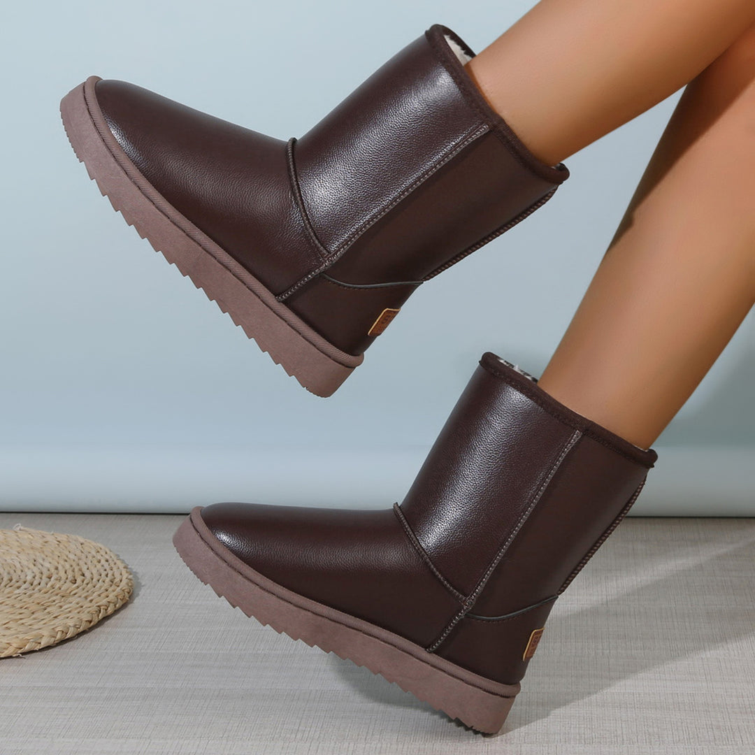 Damen Winterstiefel mit Teddyfutter, Lederoptik und flacher Plateau‑Sohle Drune