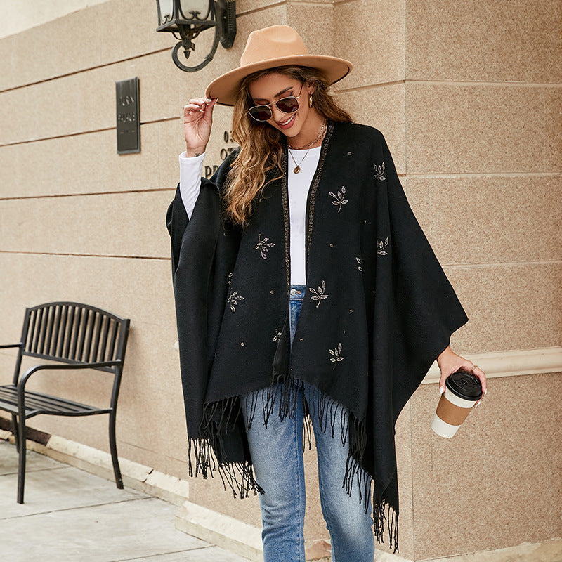 Damen Eleganter Poncho mit floralem Stickmuster und fransigen Kanten Drune