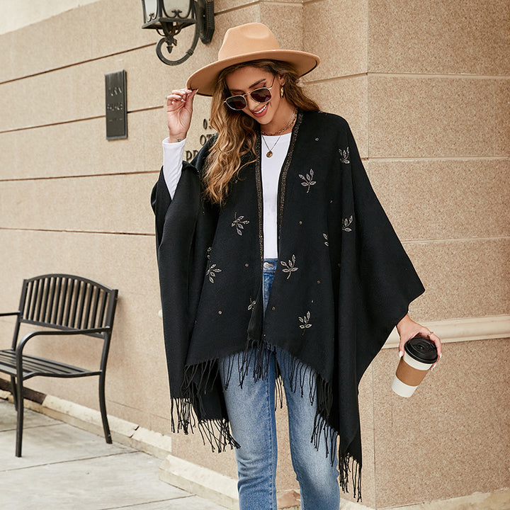 Damen Eleganter Poncho mit floralem Stickmuster und fransigen Kanten Drune