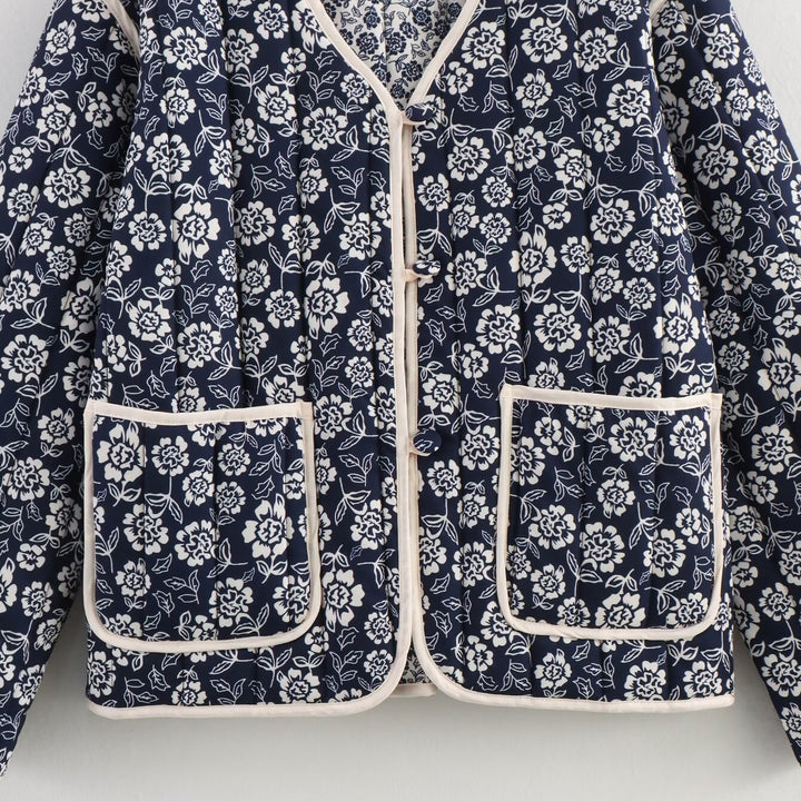 Damen gesteppte Jacke mit floralem Allover, V-Ausschnitt, Kontrastpaspel und aufgesetzten Taschen Drune