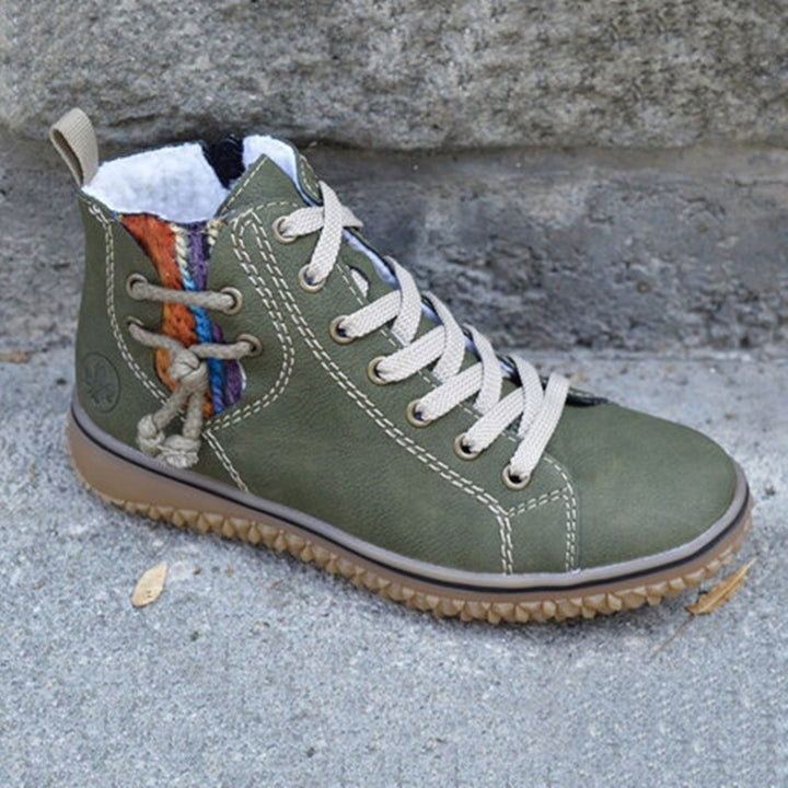 Damen High-Top Sneaker-Boot mit seitlichem Reißverschluss, dekorativem Knöchelriemen und profilierter Gummisohle Drune