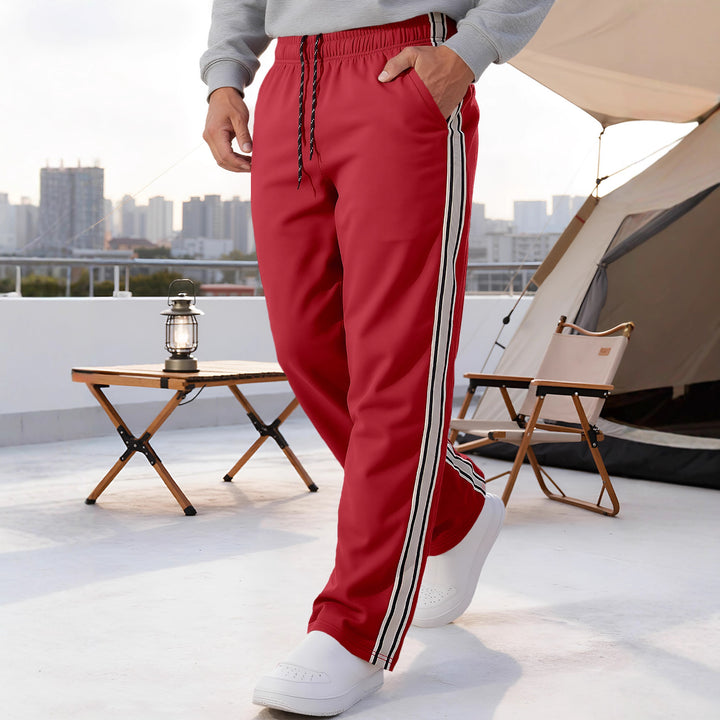 Herren nan Retro-Trackhose mit schmal zulaufendem Bein elastischem Bund Tunnelzug und seitlichen Streifen Drune