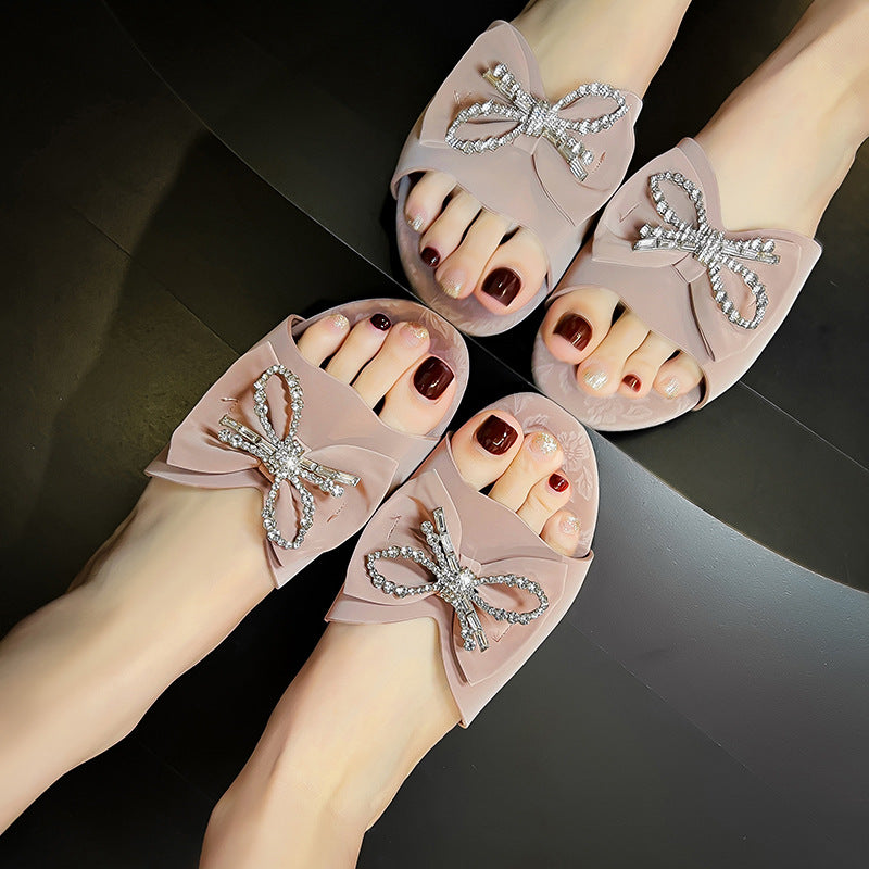 Damen Kunststoff Pantoletten mit eleganter Schleifenverzierung Drune