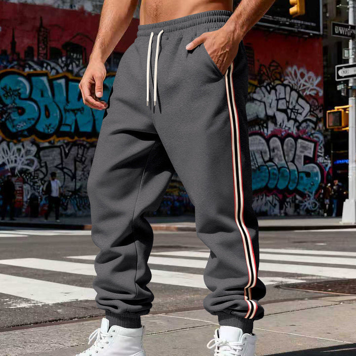Herren lässige Jogginghose mit seitlichen Kontraststreifen, Gummibund und Bündchen Drune