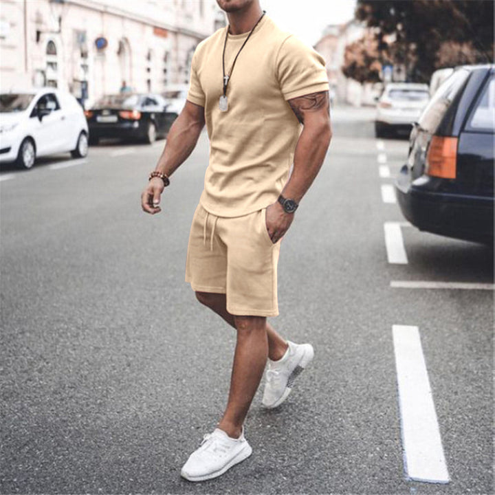 Herren nan figurbetontes Kurzarmshirt mit verstärkter Schulternaht und elastischer Kordelzug-Bermuda aus Stretchjersey Drune
