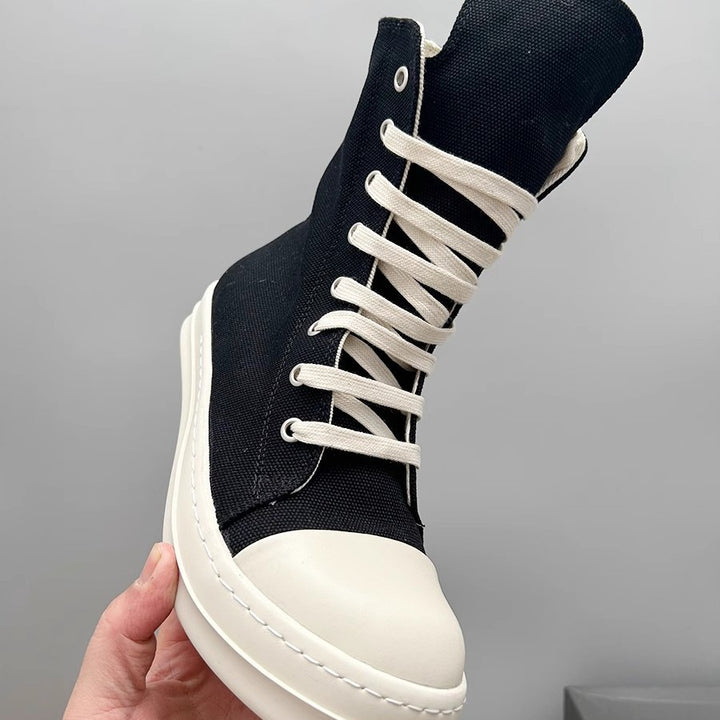 Damen Plateau-Boots mit überhöhter Gummiplattform, hohem Schaft und verstärkter Zehenkappe Drune