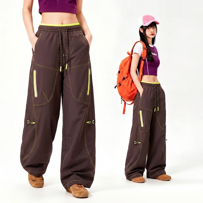 Damen Oversize Tech-Loungehose mit Kontrastnähten, reflektierenden Reißverschlusstaschen & Kordelbund Drune