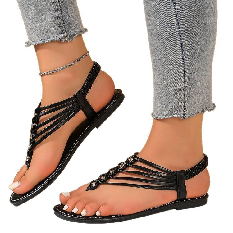 Damen modische und luftige Zehentrenner-Sandalen mit dekorativen Riemen Drune