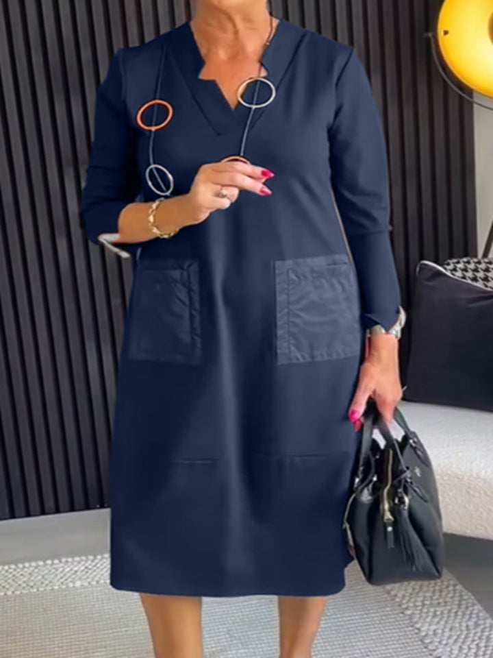 Damen nan knielanges, locker fallendes Kleid mit V-Ausschnitt Kontrasttaschen aus Satin und Dreiviertelärmeln Drune