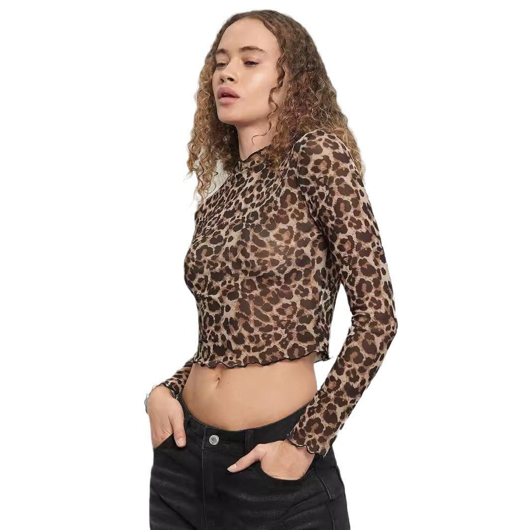 Damen nan figurbetontes bauchfreies Langarmshirt im Animalprint aus feinem Stretchnetz mit Stehkragen und Wellensaum Drune