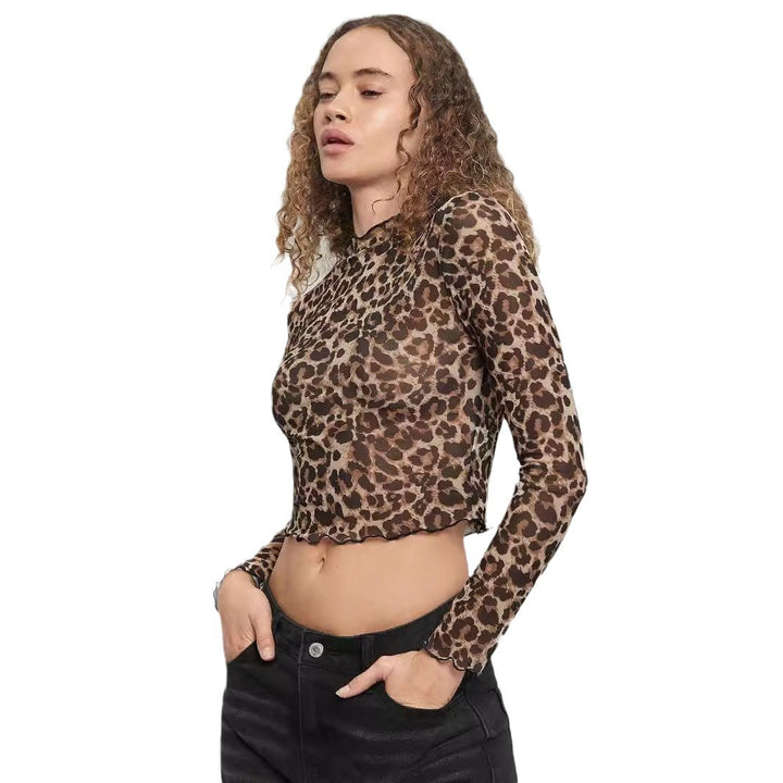 Damen nan figurbetontes bauchfreies Langarmshirt im Animalprint aus feinem Stretchnetz mit Stehkragen und Wellensaum Drune