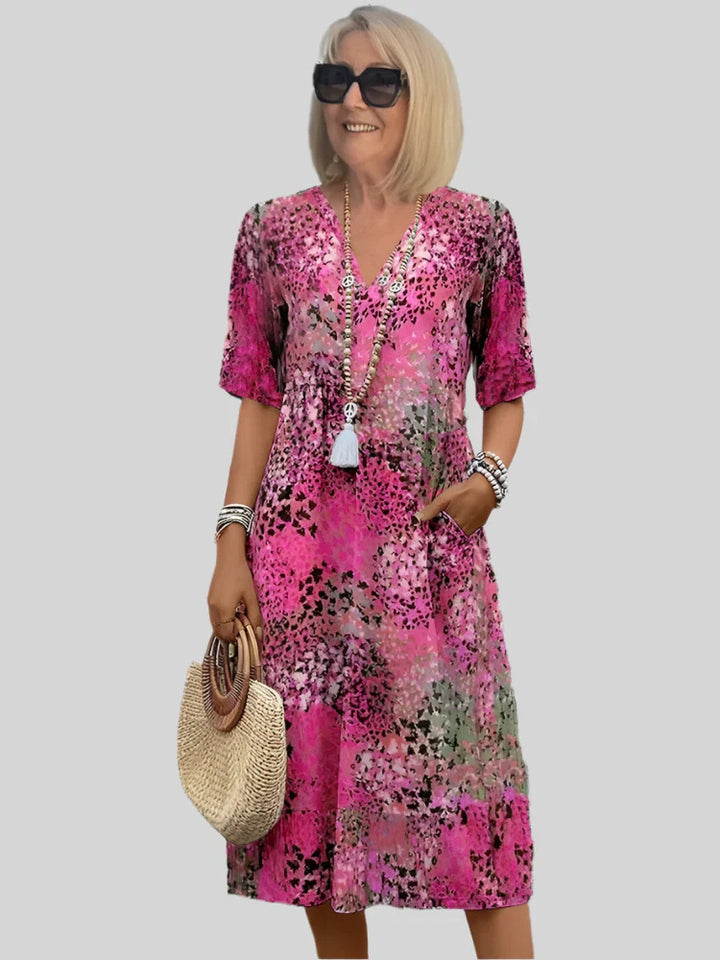 Damen Blumenmuster Midi Kleid mit Taschen Drune