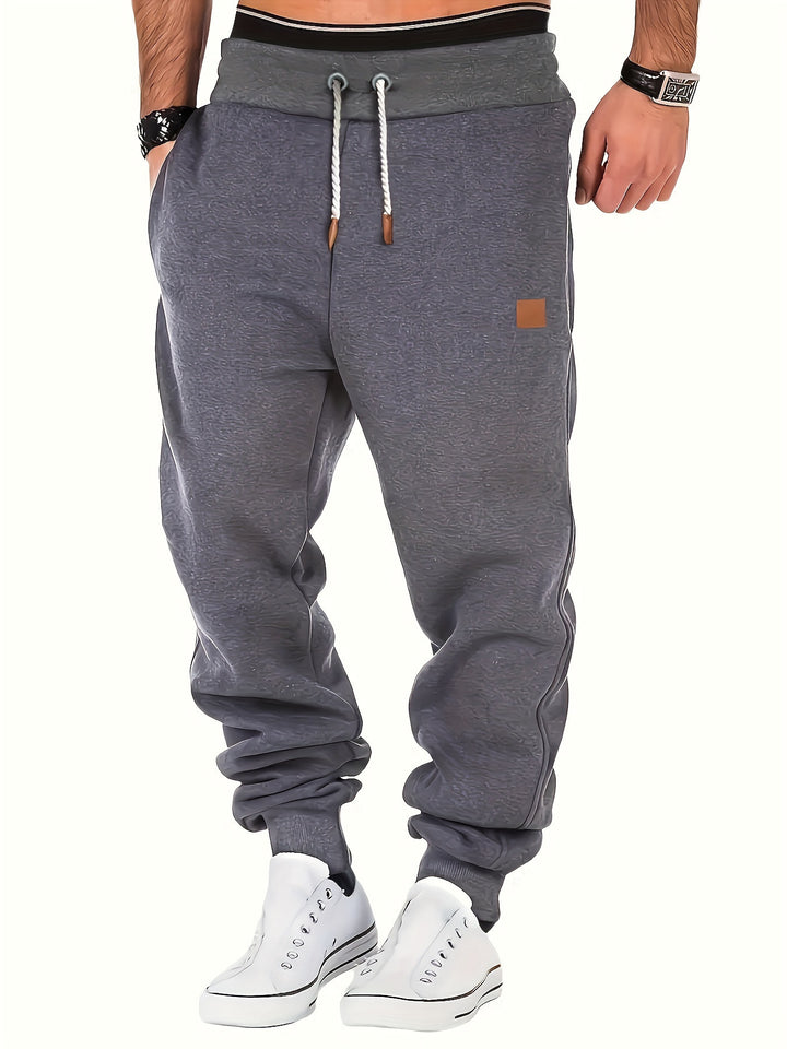 Herren melierter Relax-Jogger mit breitem Komfortbund, gedrehtem Kordelzug und gerippten Knöchelabschlüssen Drune