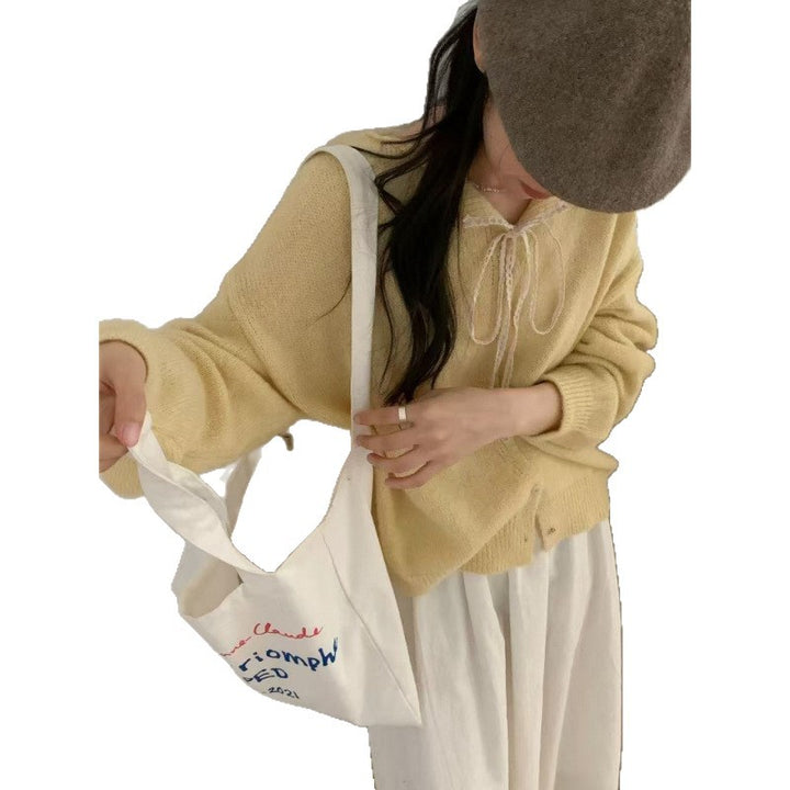 Damen Knopf-Cardigan mit romantischem Kordelzug Drune