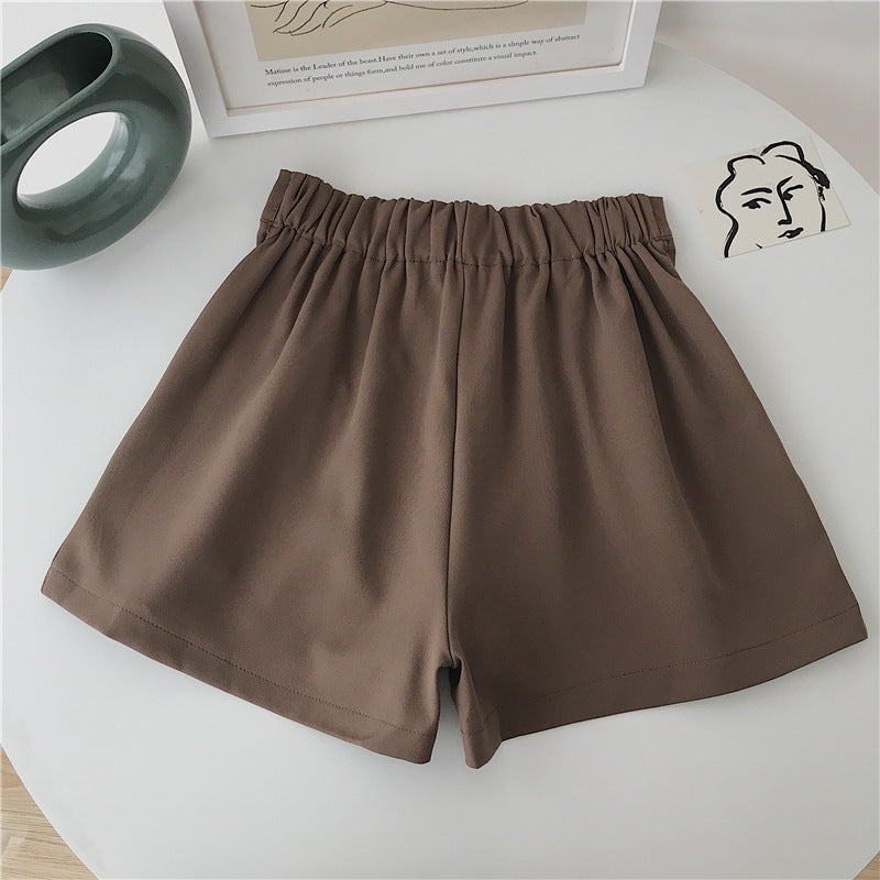 Damen elegante Shorts mit Faltenwurf und Knopfdetail