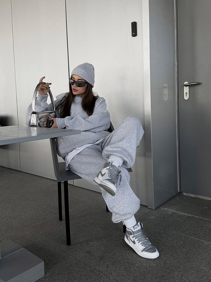 Damen urbanes Oversize-Lounge-Set mit Kapuzenpullover, locker geschnittener High-Waist-Jogginghose und passender Mütze Drune