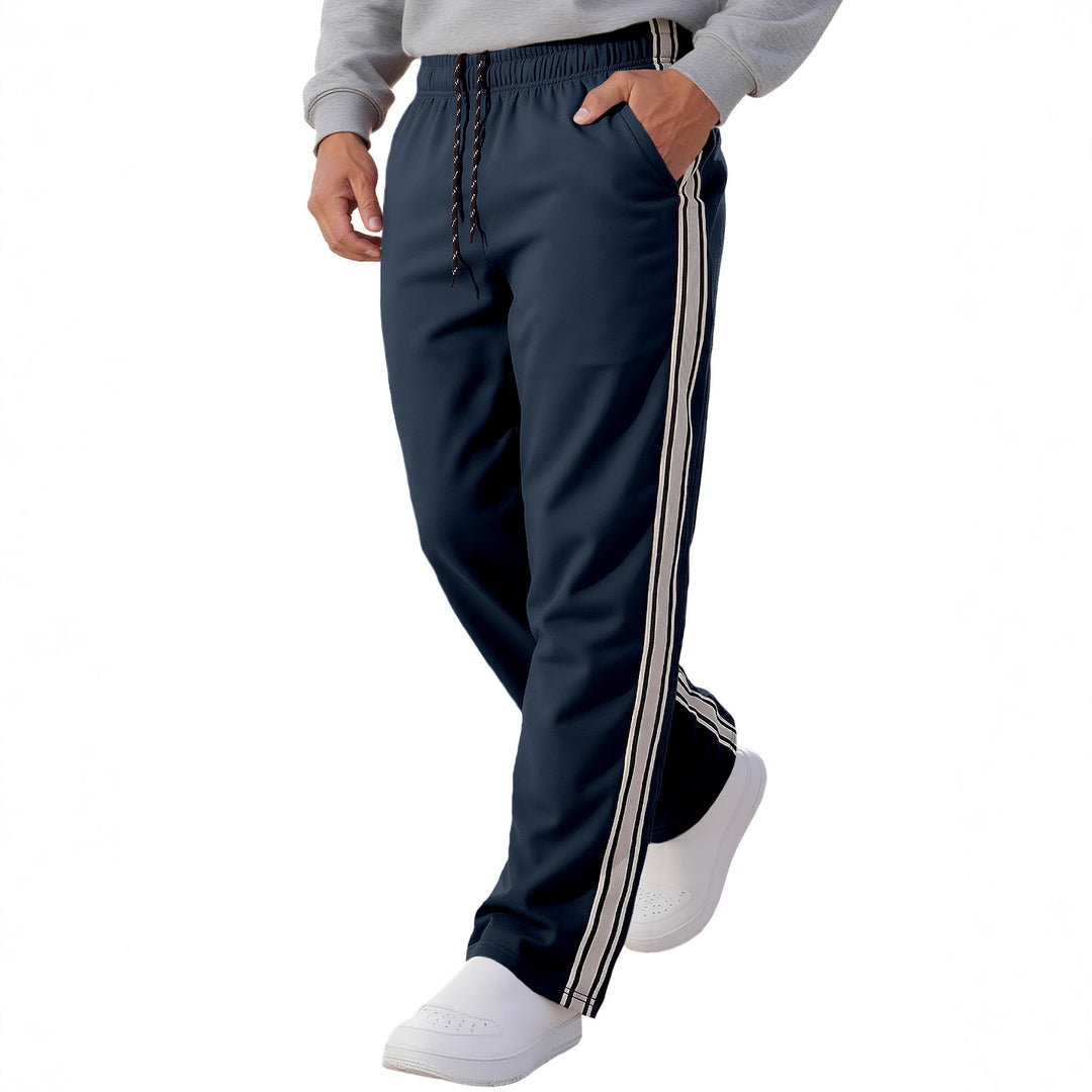 Herren nan Retro-Trackhose mit schmal zulaufendem Bein elastischem Bund Tunnelzug und seitlichen Streifen Drune