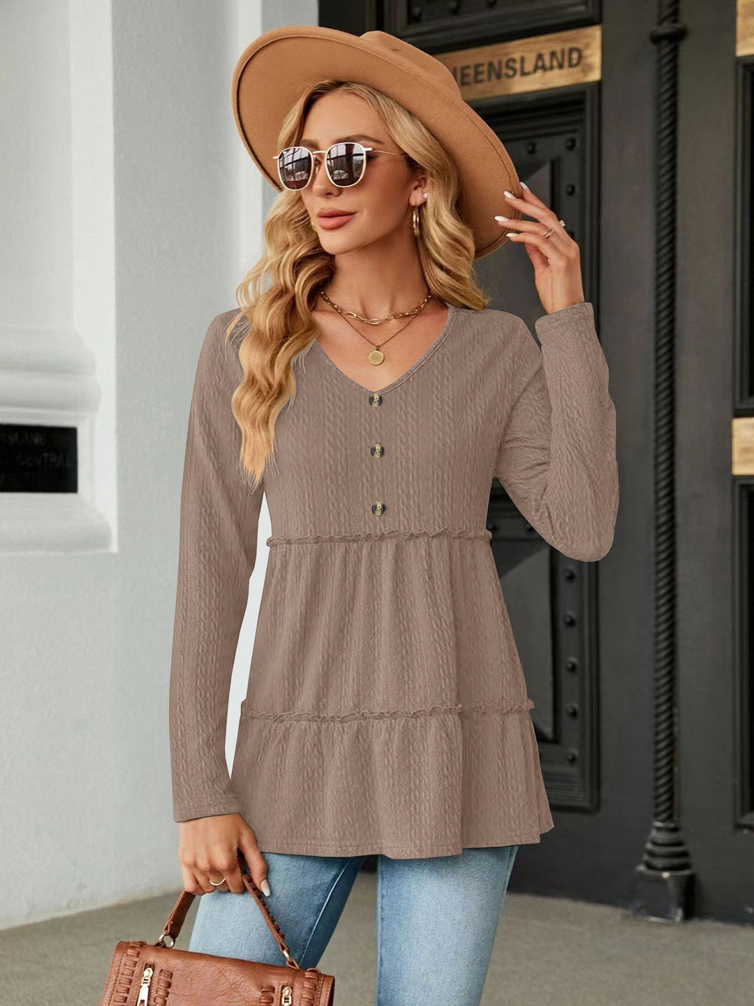 Damen Ärmelloses V-Ausschnitt Shirt mit Knopfdetails und voluminösem Saum Drune