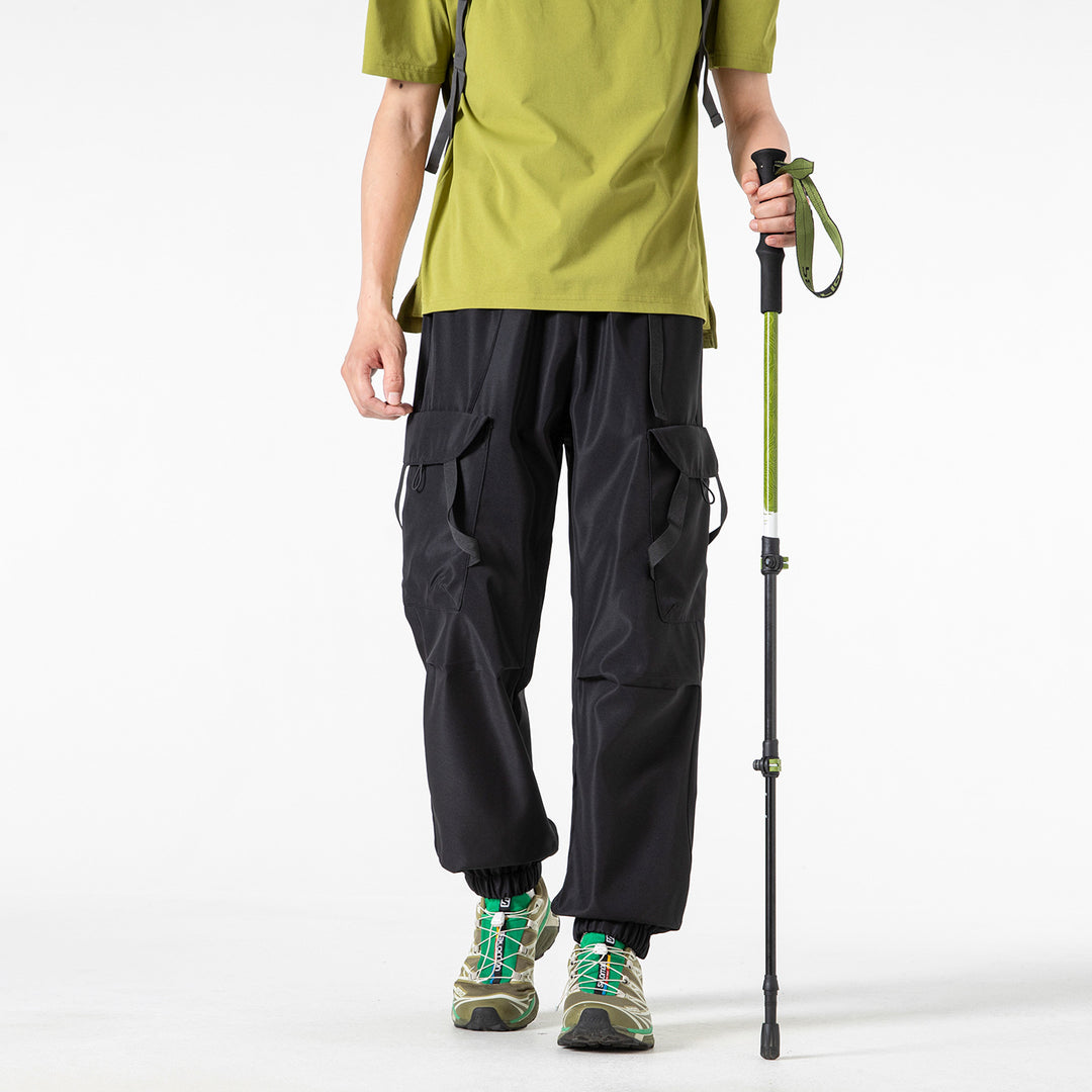 Herren Utility-Cargohose im Joggerstil mit Elastikbund, Klapp-Taschen und verstellbaren Riemen Drune