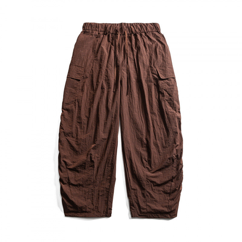 Unisex Weite Cropped Cargo-Hose mit elastischem Bund, Tunnelzug und aufgesetzten Taschen Drune