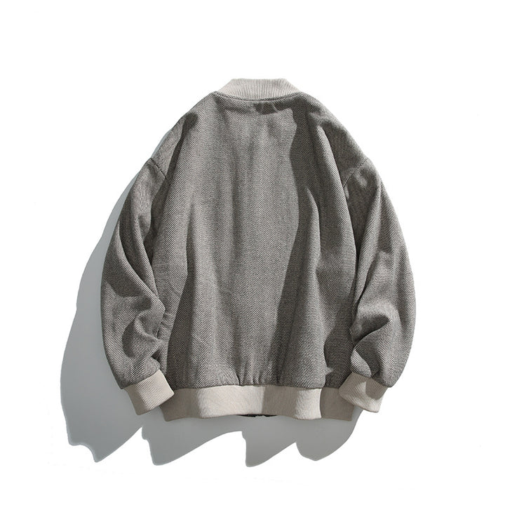 Unisex Boxy-Bomberjacke im Fischgrät-Look mit Rippbündchen, Pattentaschen und verdeckter Druckknopfblende Drune