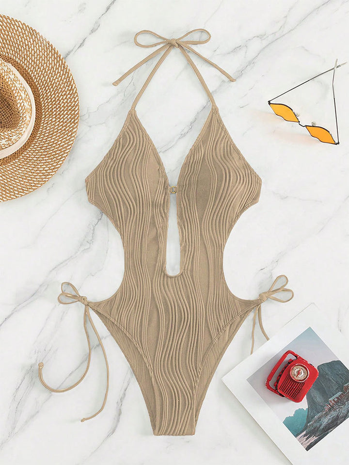 Damen Einteiliger Badeanzug mit raffiniertem Cut-Out und stylischem Wellenmuster Drune
