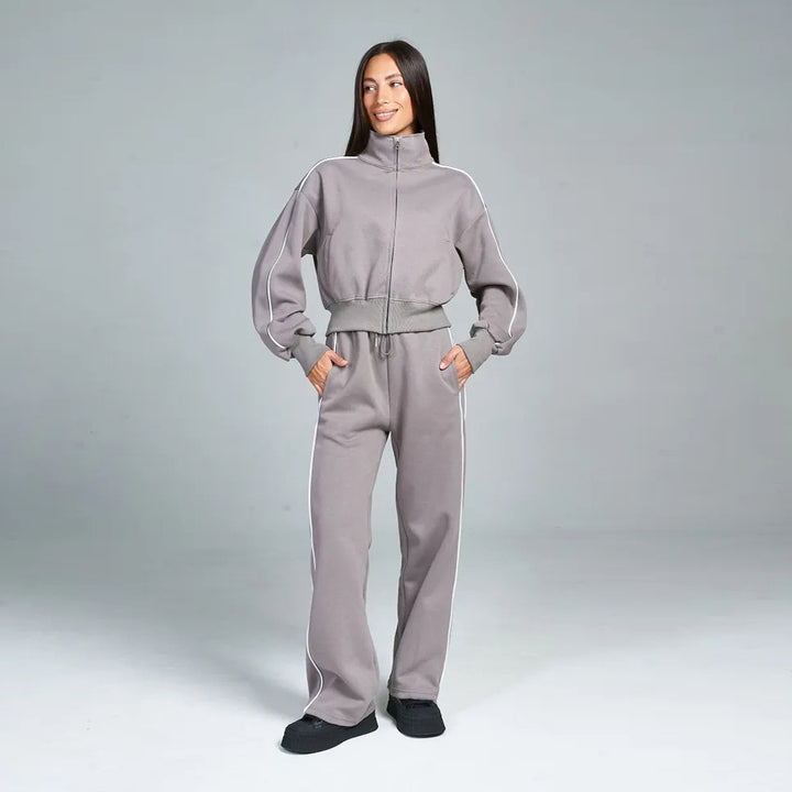 Damen Sportanzug mit hohem Stehkragen und weiten Hosen Drune