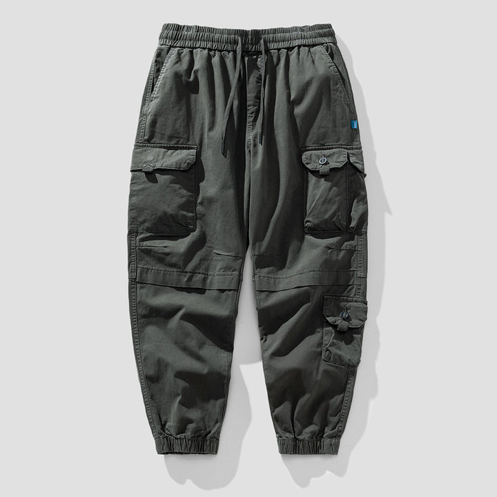 Herren Leichte Canvas-Cargohose im Joggerstil mit elastischem Bund, segmentierten Kniepaneelen und verdeckten Klappentaschen Drune