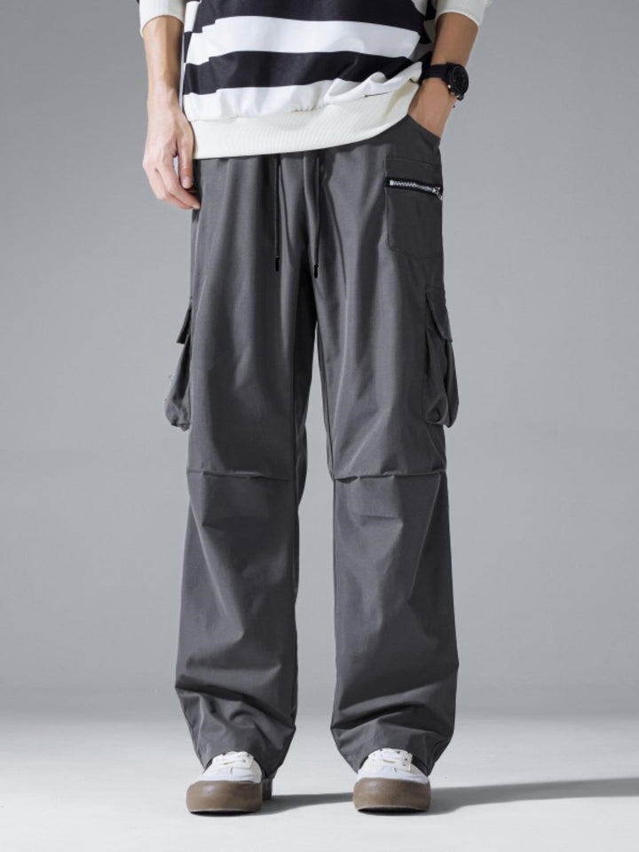 Herren Weite Cargo‑Hose im Baggy‑Cut mit Tunnelzugbund, Zipper‑Tasche & Klappfächern Drune