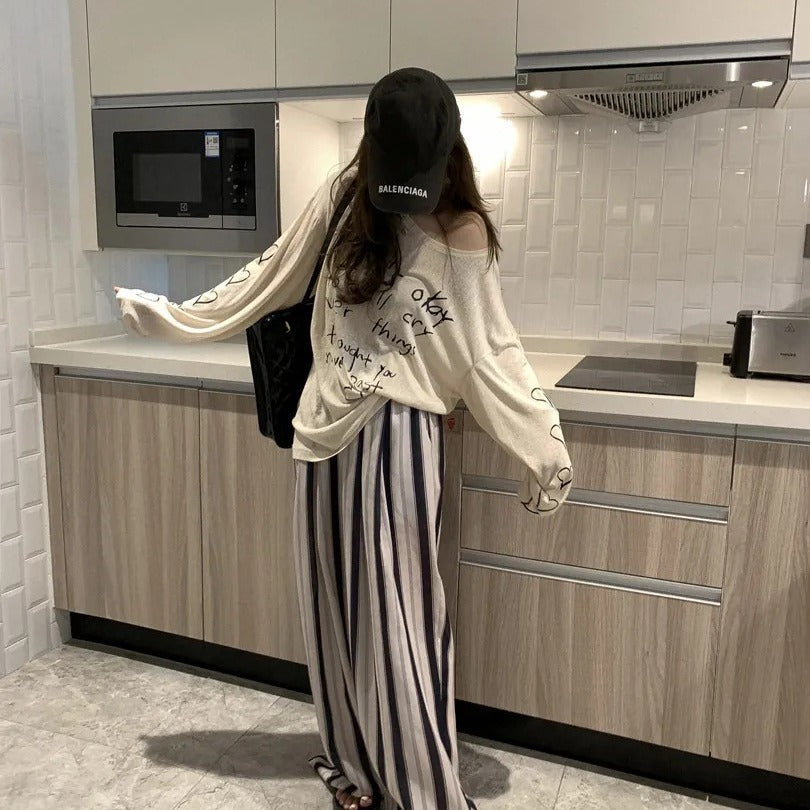 Damen lässiges Oversized-Oberteil mit off-Shoulder Design und künstlerischem Schriftzug Drune