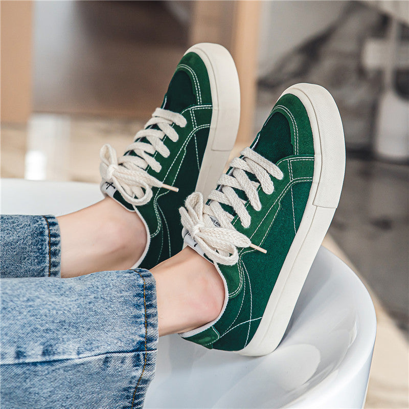 Unisex lässiger Canvas-Low-Top Sneaker mit kontrastnaher Ziersteppung und gepolsterter Plateausohle Drune