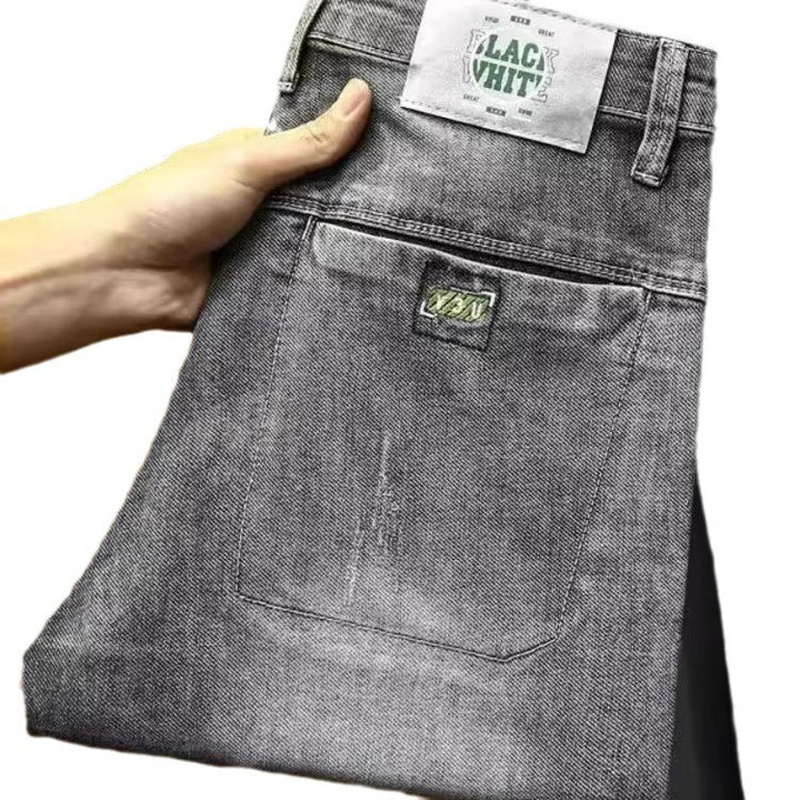 Herren lässige Jeans mit modernen Used-Effekten und konisch zulaufendem Bein Drune