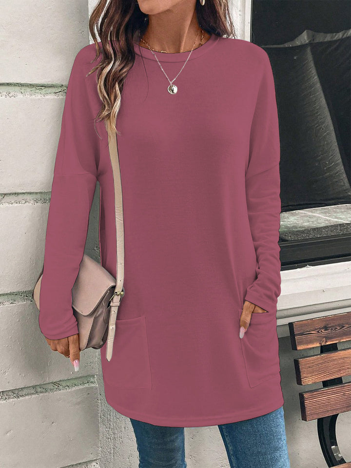 Weit geschnittene lange Tunika für Damen mit rundem Ausschnitt, seitlichen Taschen und weichem Jersey Drune