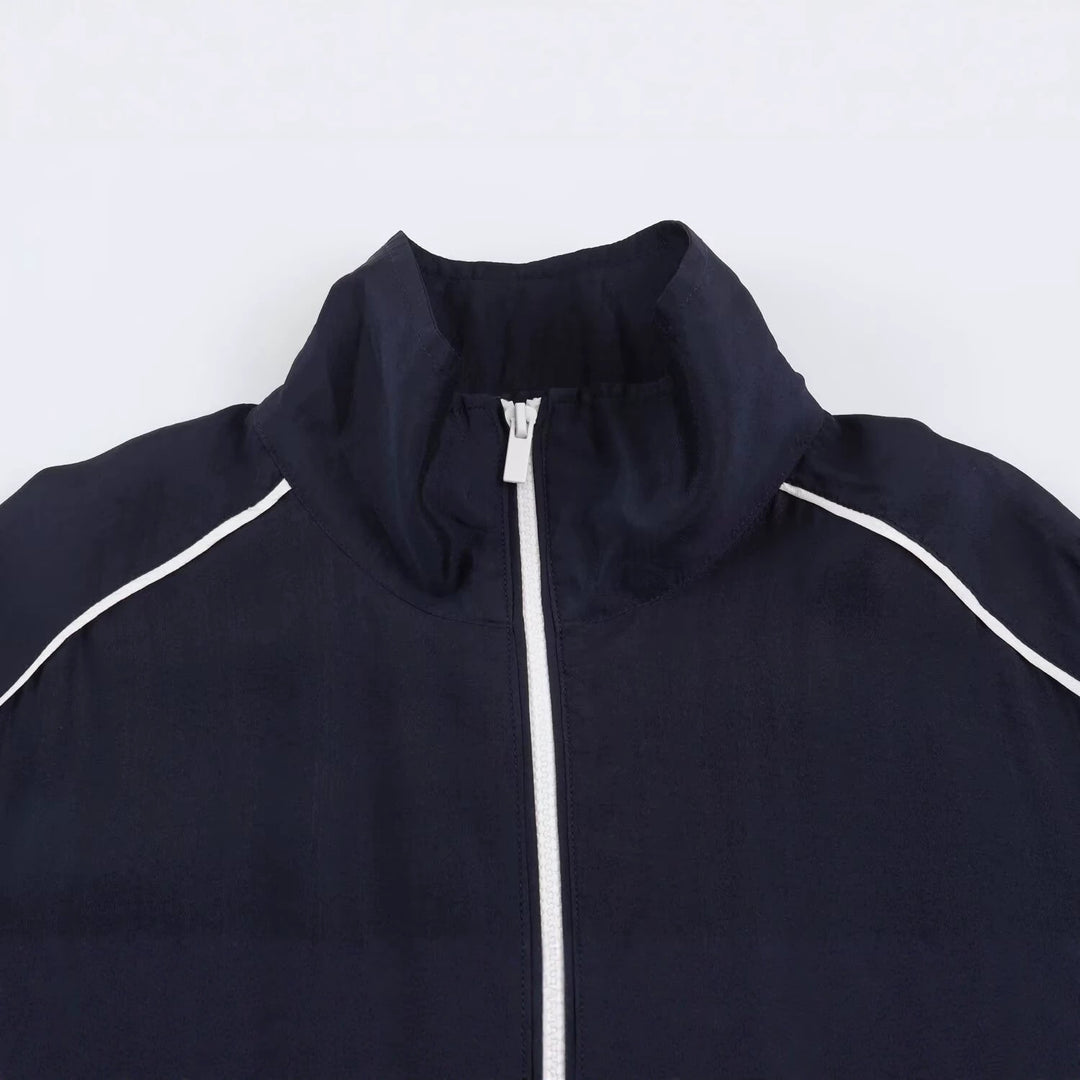 Damen Kurz geschnittene Windjacke mit hohem Kragen und elastischem Saum Drune